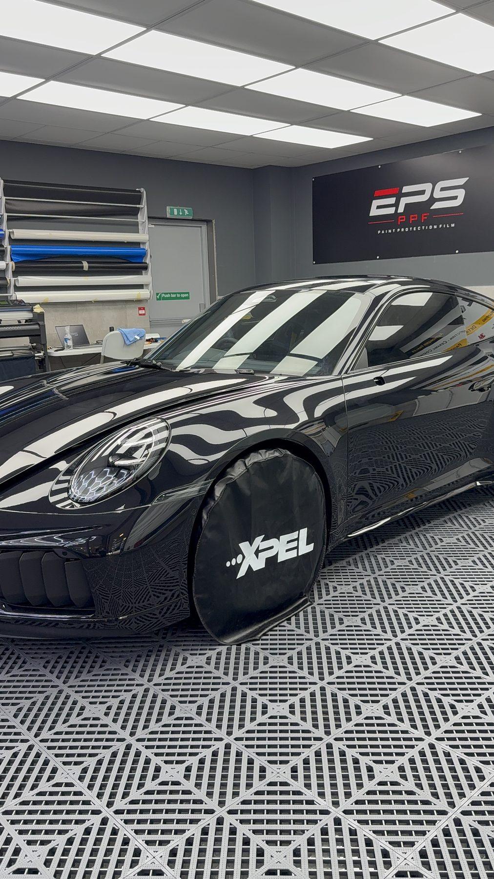 Black Porsche 911 in the EPS PPF Watford bay